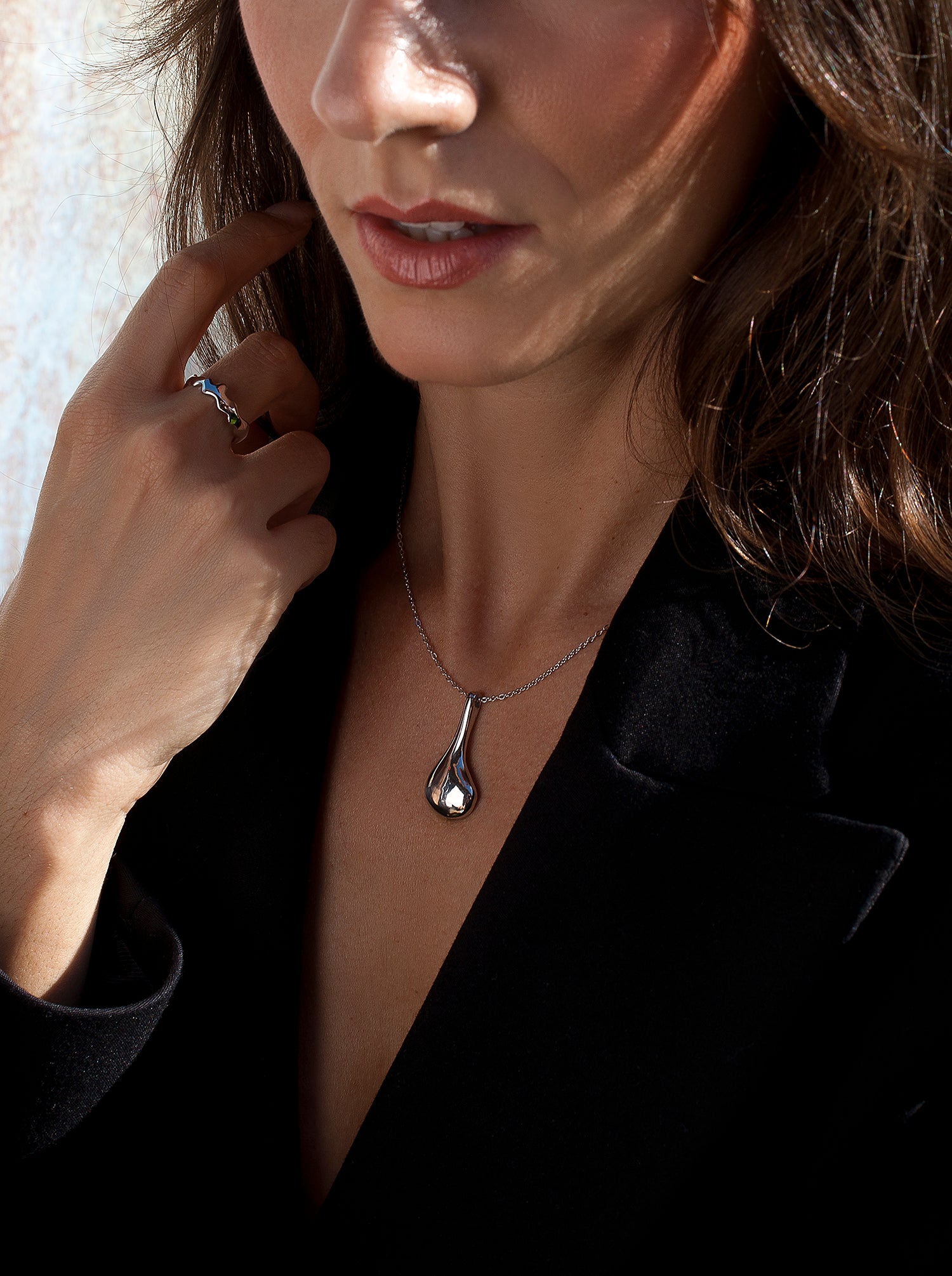 Original silver necklaces with a teardrop design