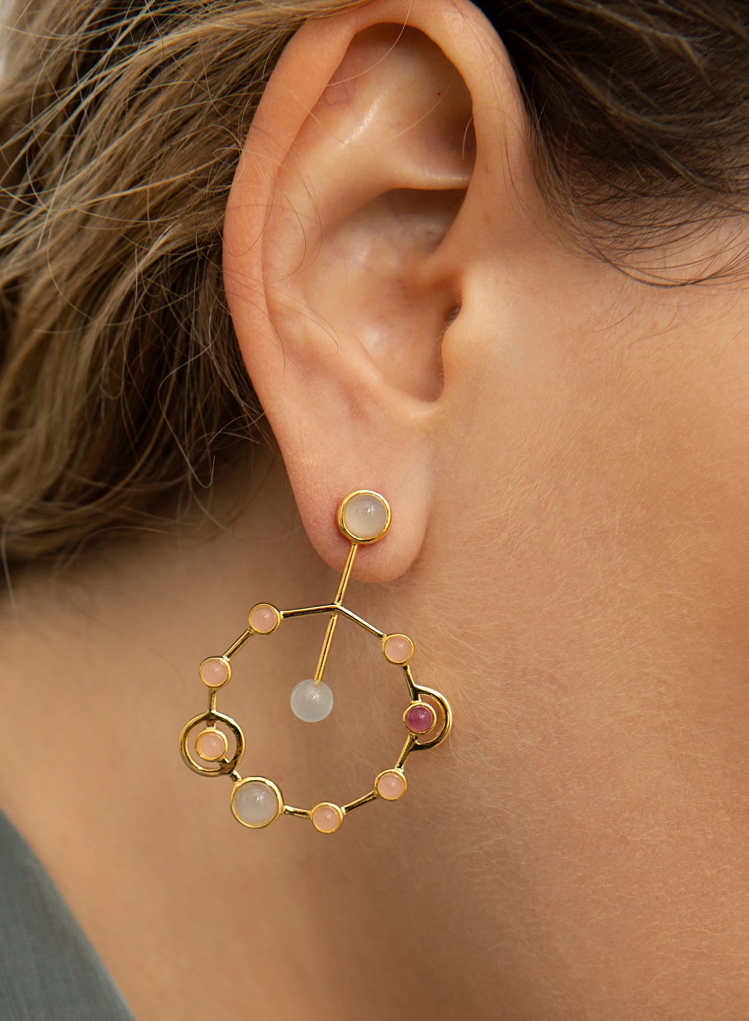 Original silver earrings with an atom design and colorful stones