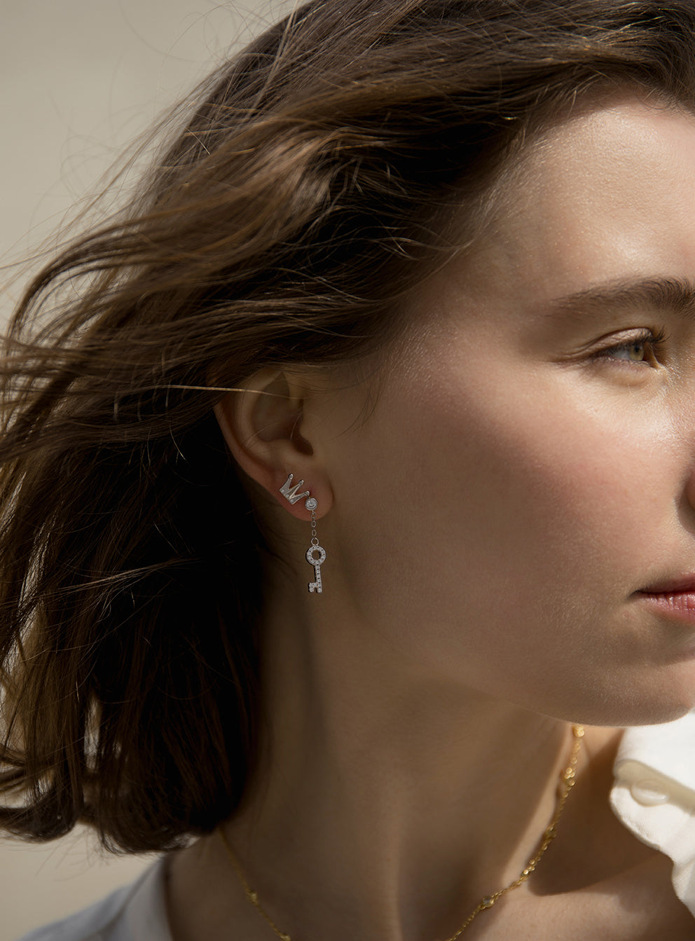 deuxìeme boucle argent avec breloque de de  et zircons