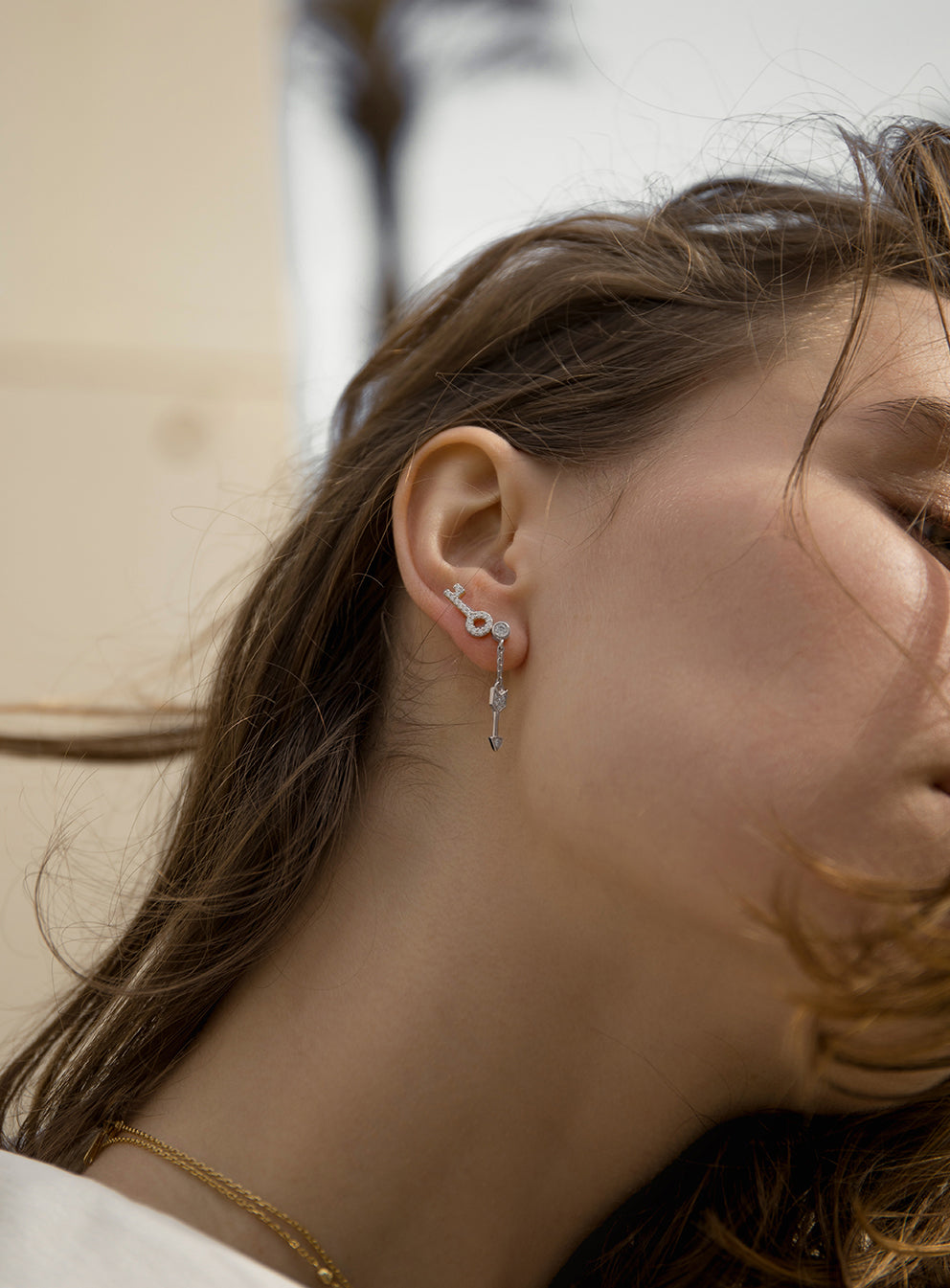 deuxìeme boucle argent avec breloque de de  et zircons