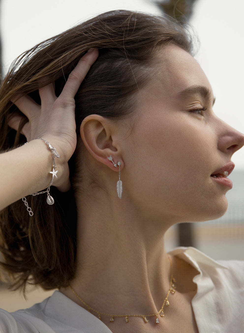 deuxìeme boucle argent avec breloque en forme de