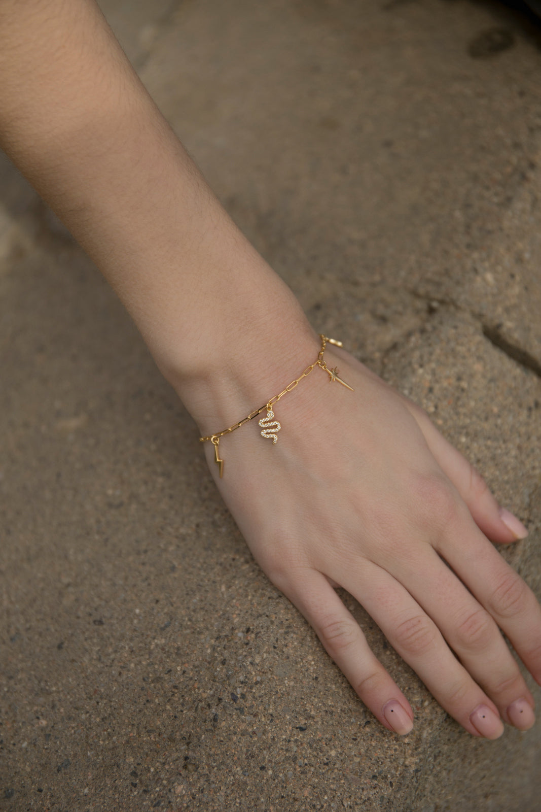 Bracelets with silver pendants, multi-charm design