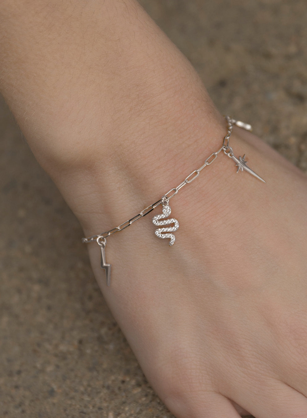 Bracelets with silver pendants, multi-charm design