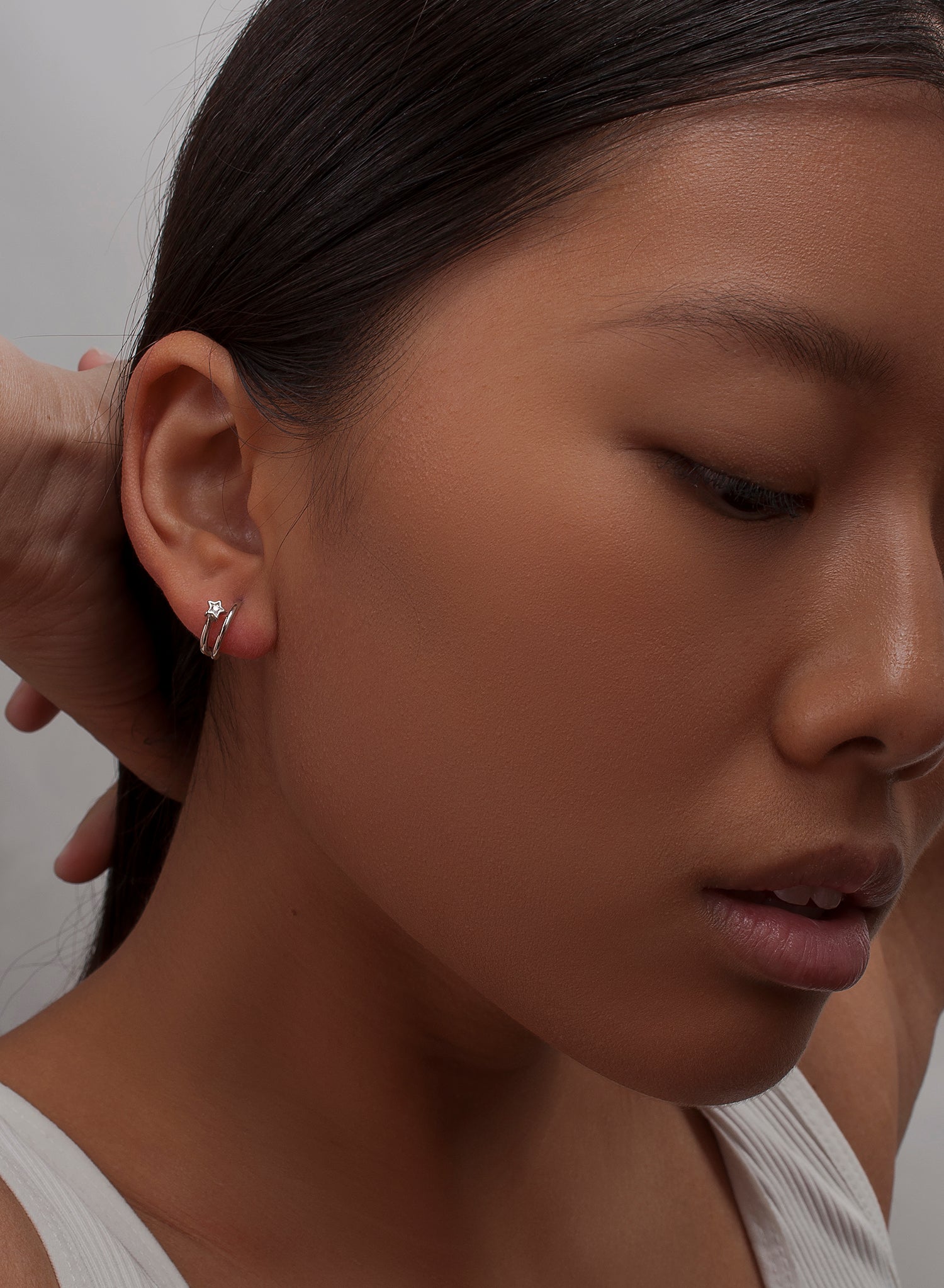 Pendientes aro de plata pequeños motivo estrella