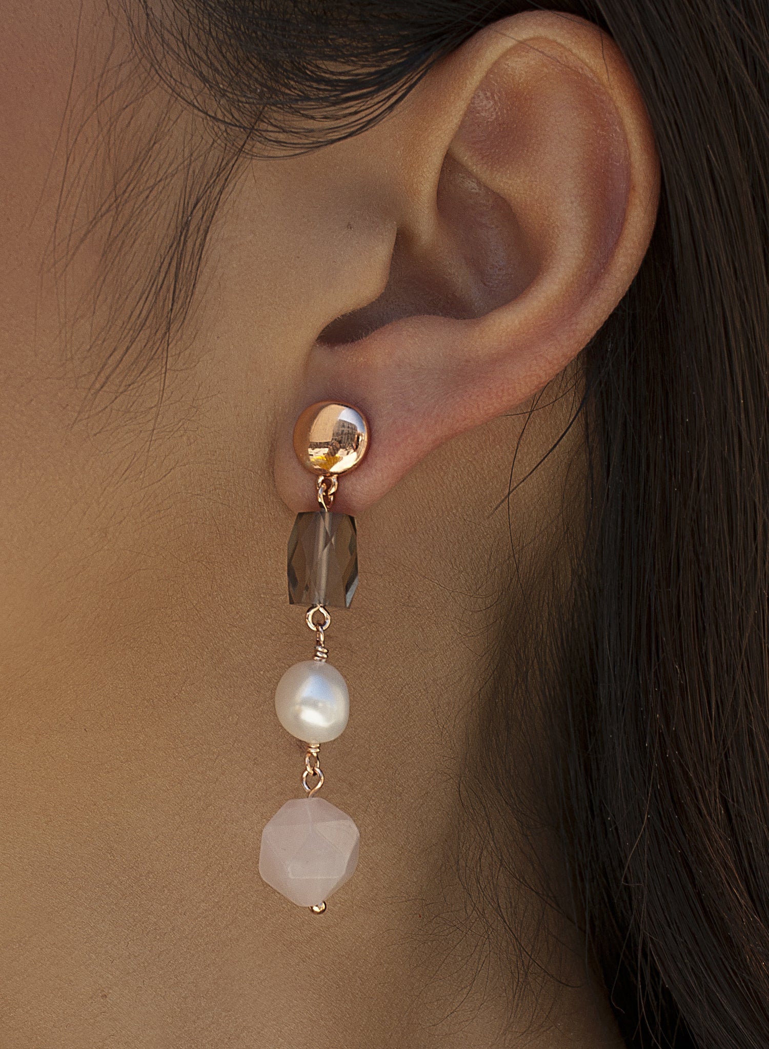 Natural stone earrings with a pearl pendant design