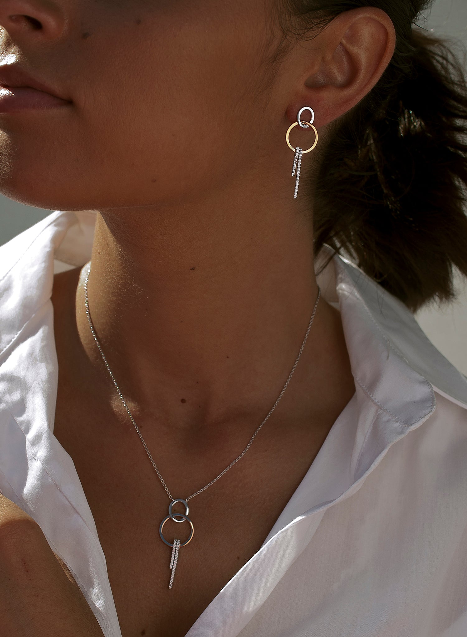 Pendientes bicolor diseño doble redonda con circonitas