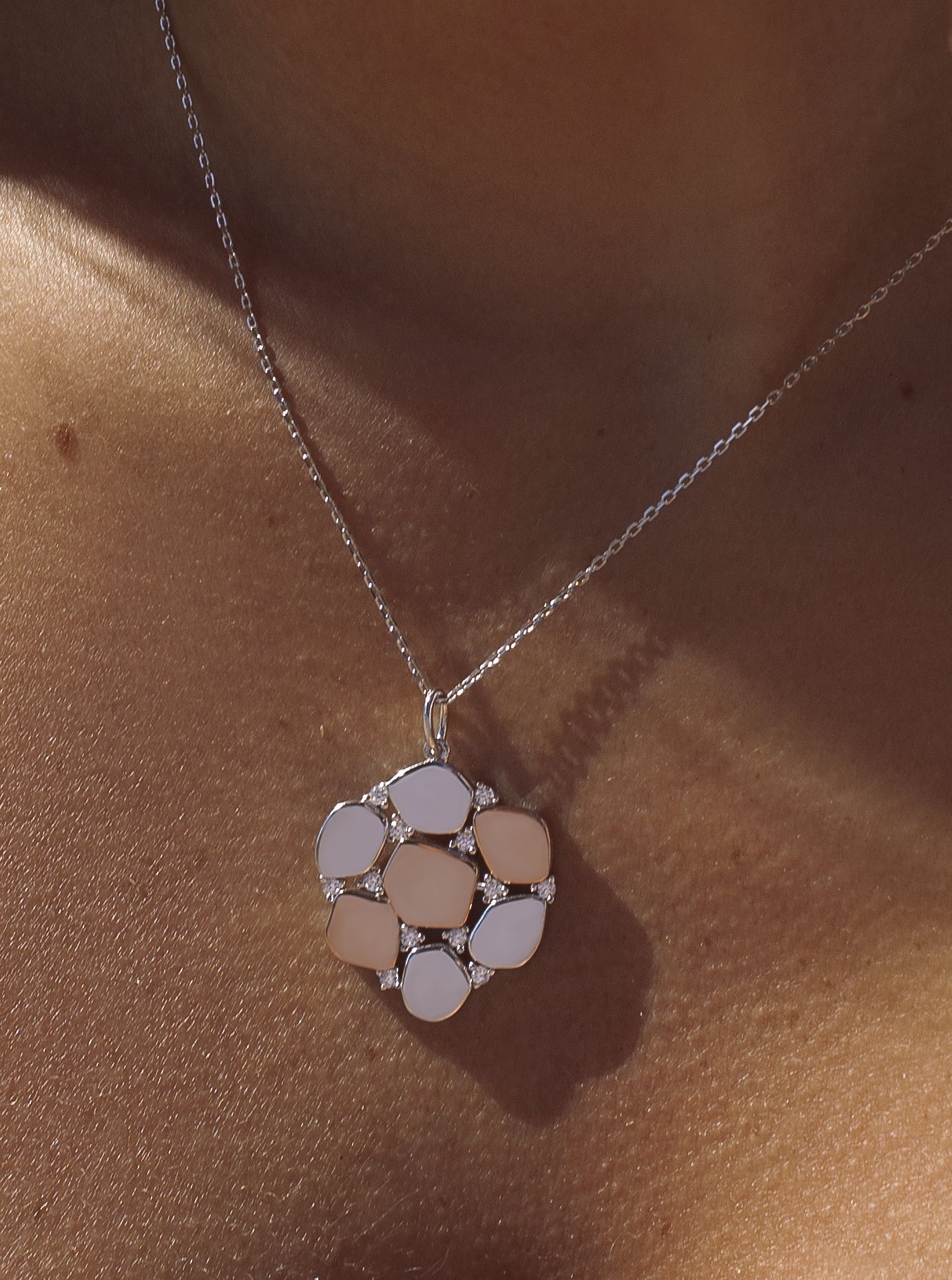 Pendentifs bicolores en argent ornés de zirconiums cubiques