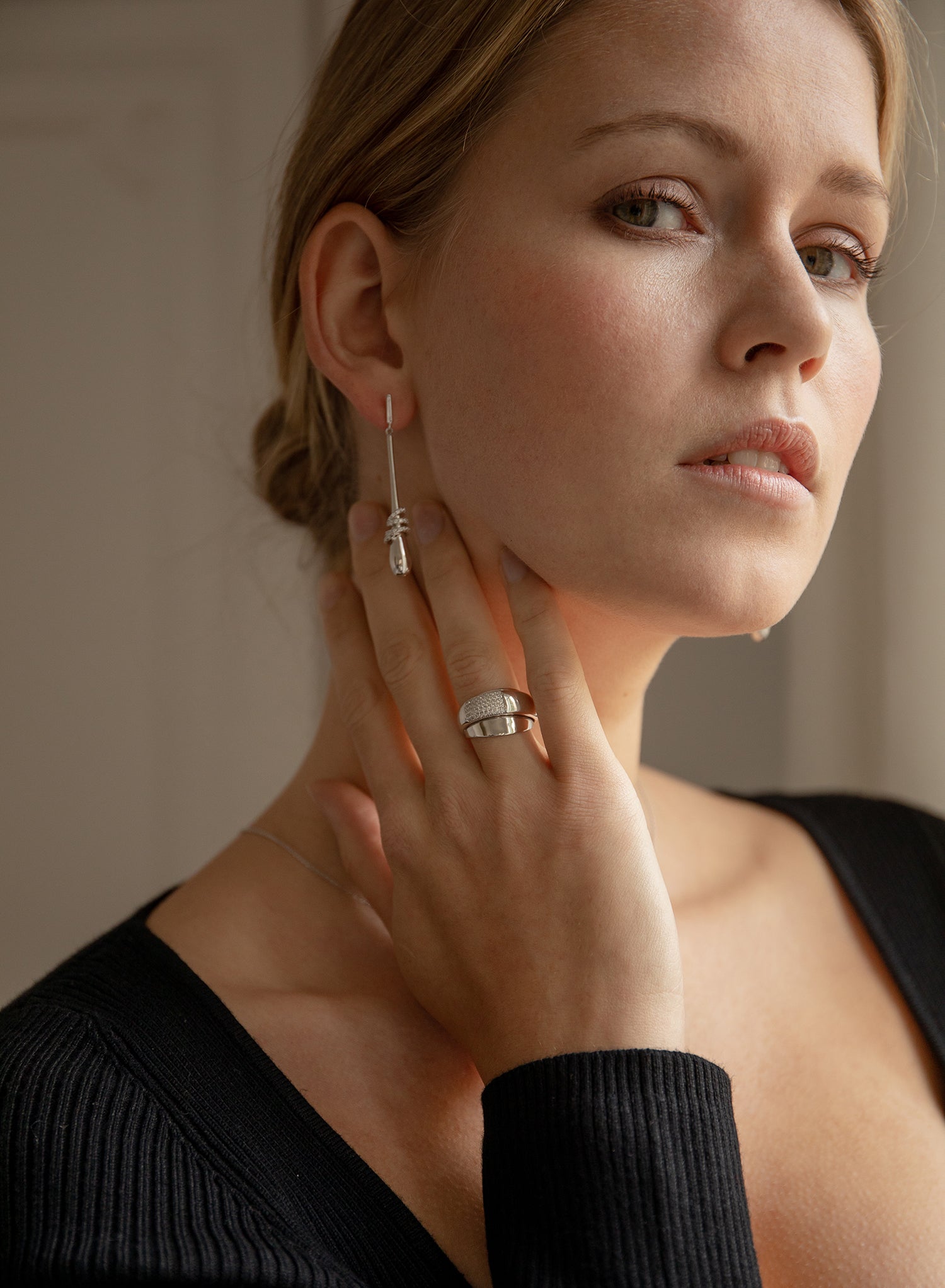 Wide rings with overlapping design and cubic zirconia