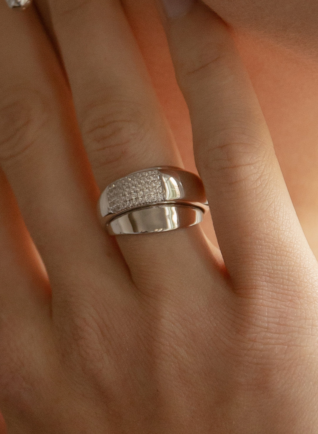 Wide rings with overlapping design and cubic zirconia