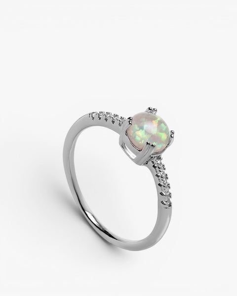 Thin rings with a circular opal-style design and cubic zirconia