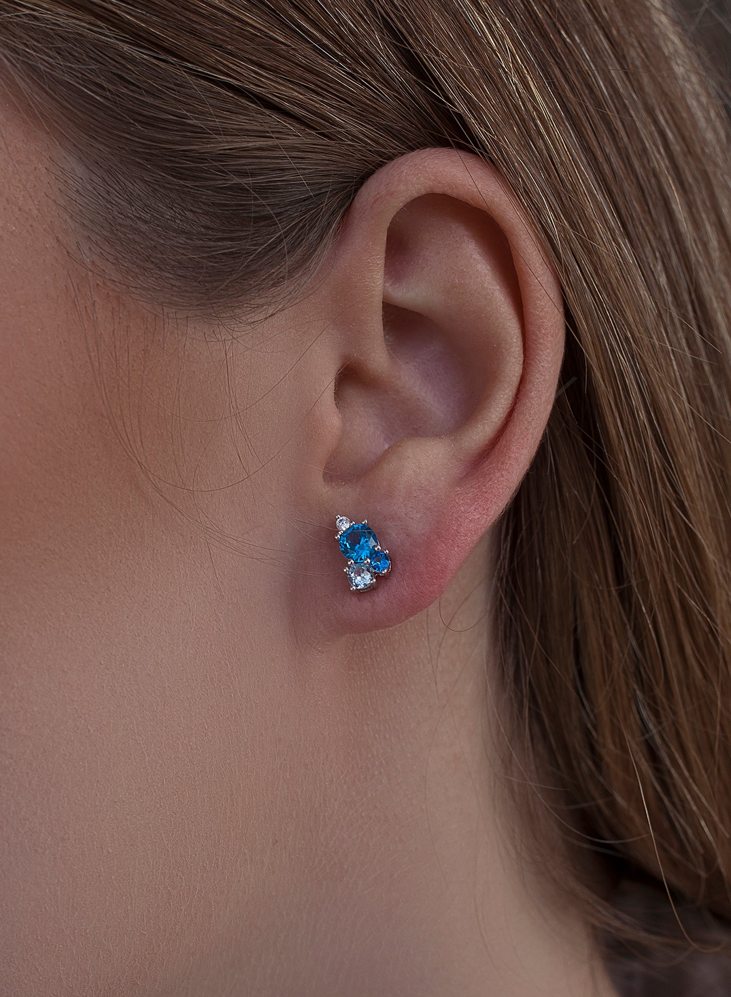 Small silver earrings with blue adamantine quartz