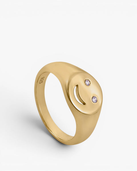 Anillo sello diseño smile con circonitas y baño de oro