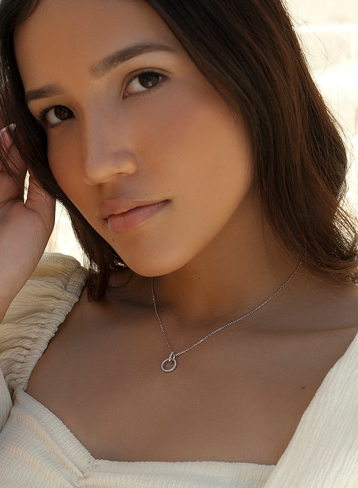 Colgantes pequeños de plata diseño circular circonitas