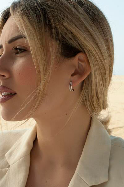 Boucles d'oreilles créoles petits design rail de zircons double