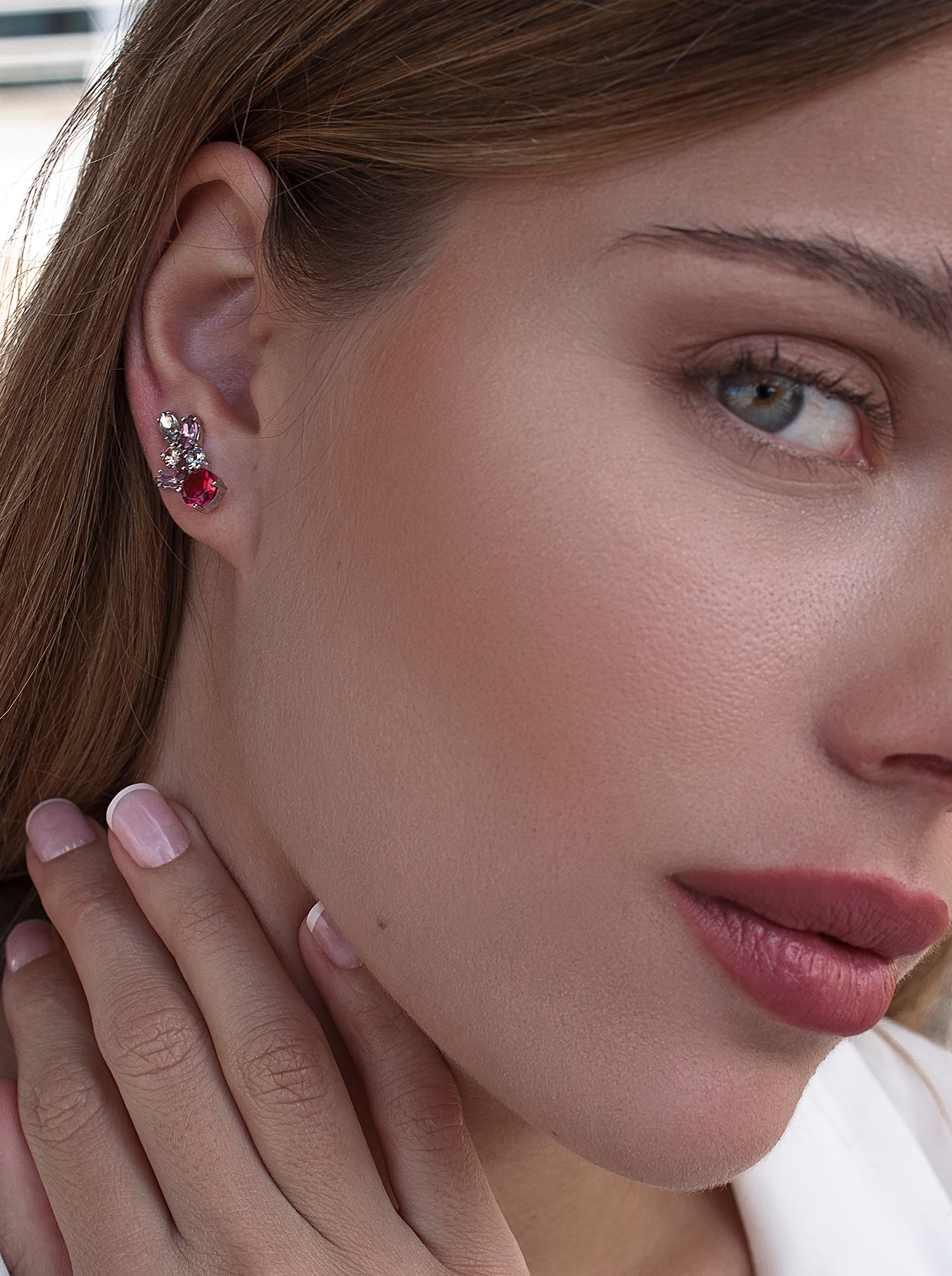 Silver climber earrings with a pink leaf design
