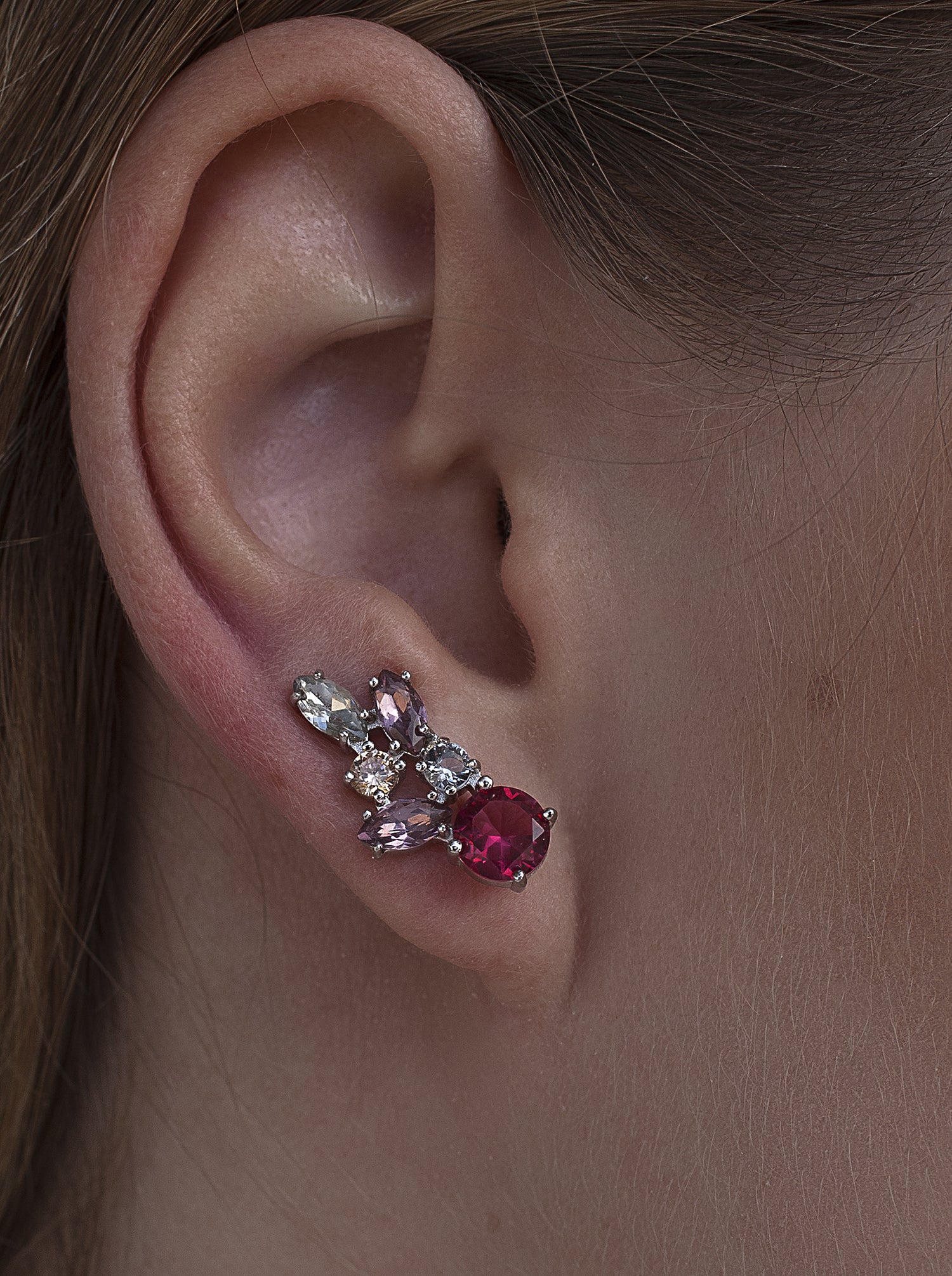 Silver climber earrings with a pink leaf design