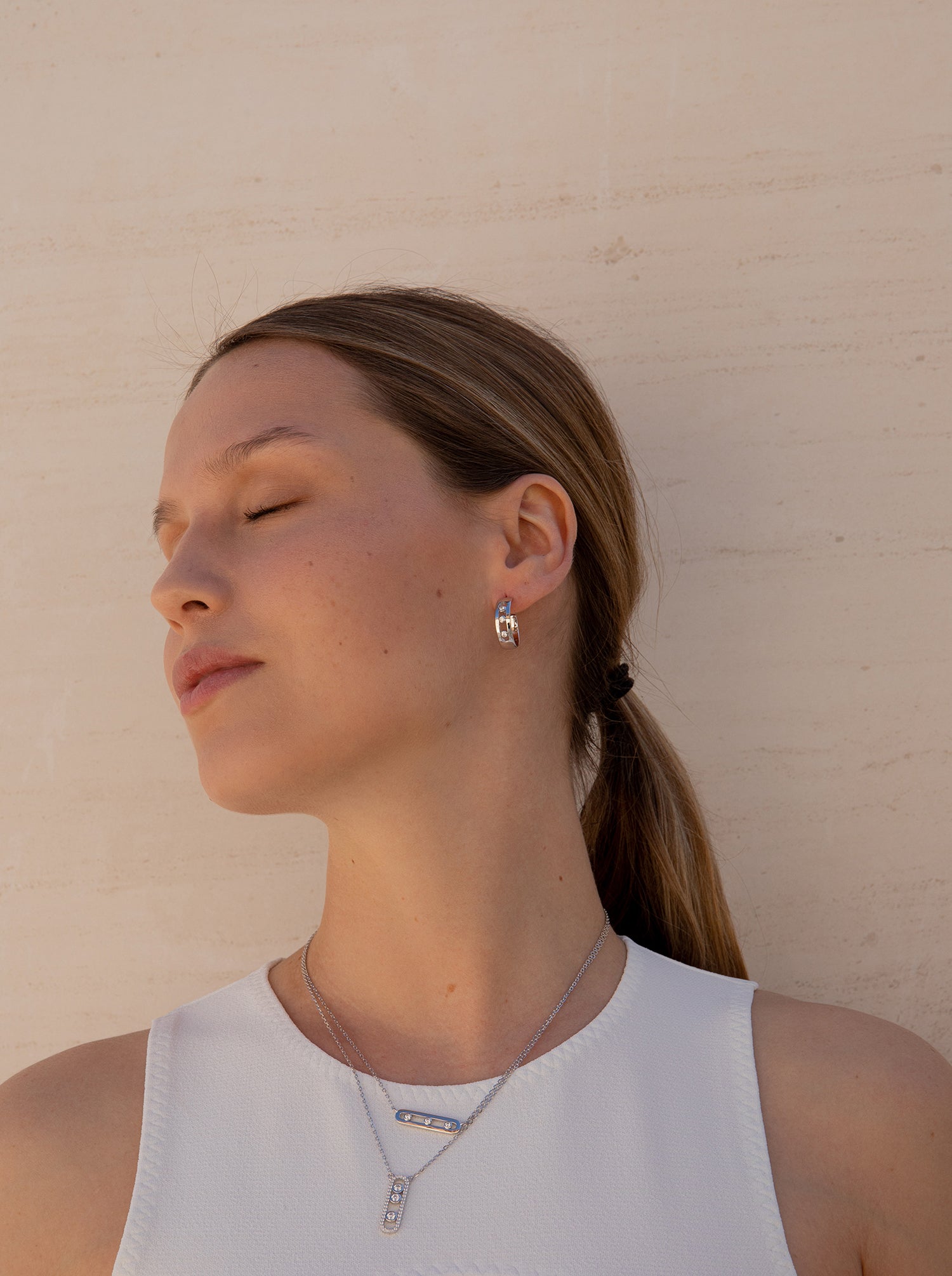 Rectangular style hoop earrings with central cubic zirconia stones