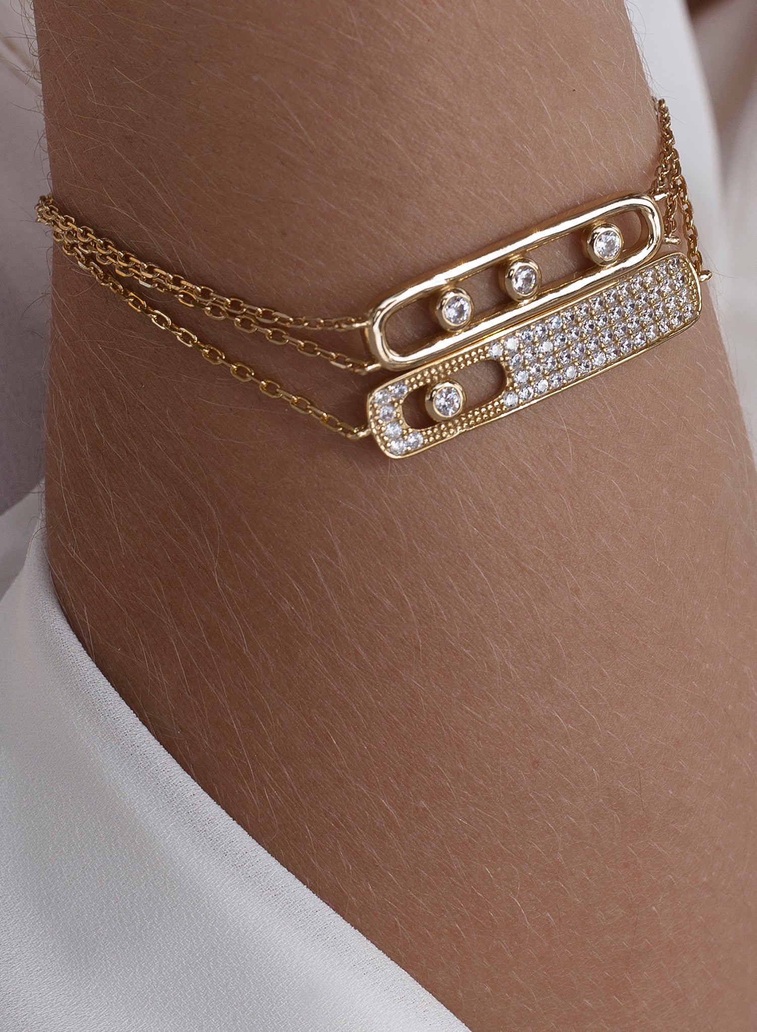 Delicate silver bracelets with a rectangular cubic zirconia