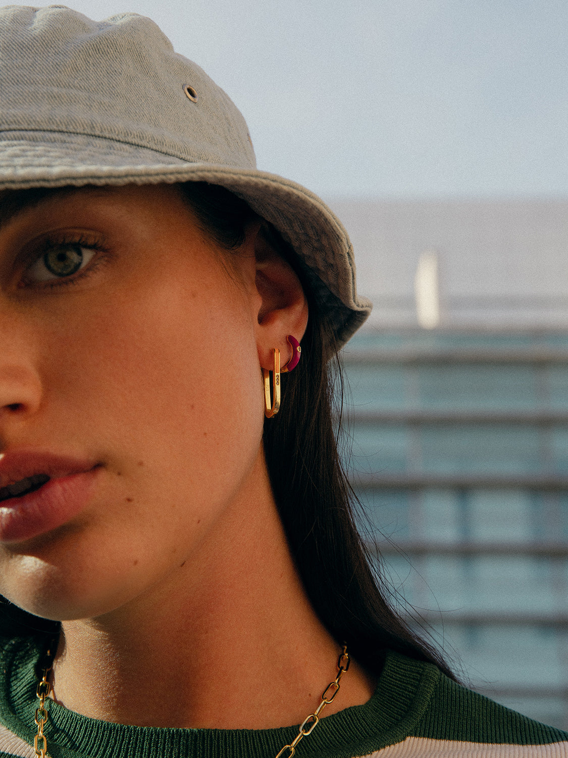 Small hoop earrings, purple enamel design with central cubic zirconia