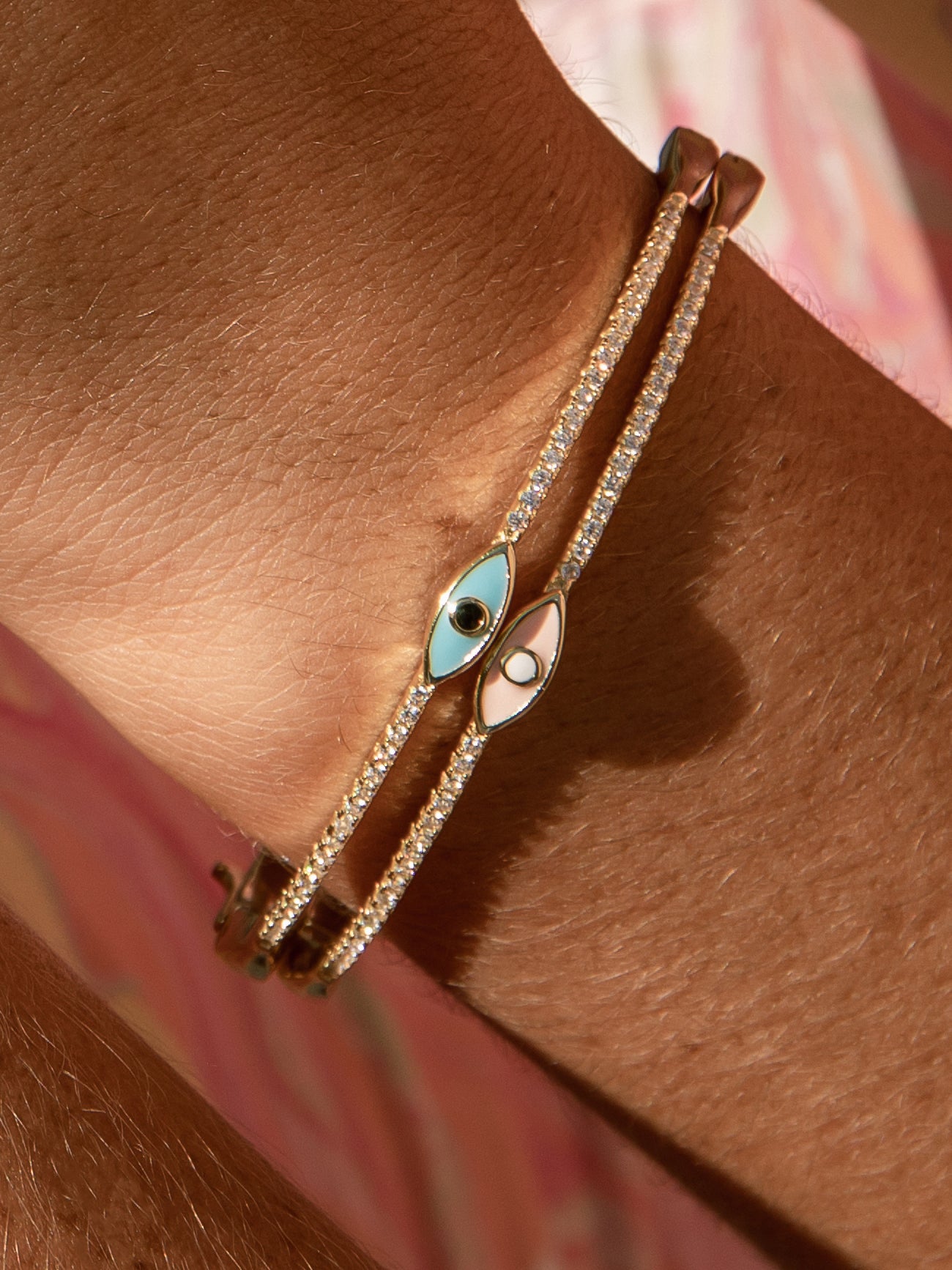 Pulsera esclava en plata diseño ojo rosa claro