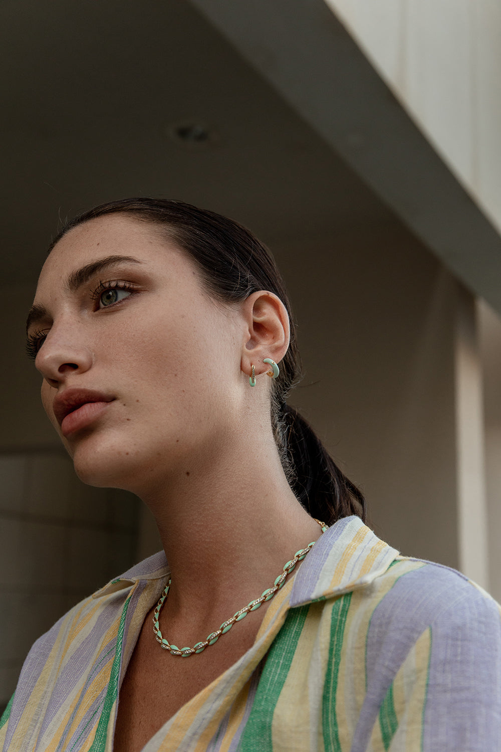 Original earrings with a "v" design combined with enamel