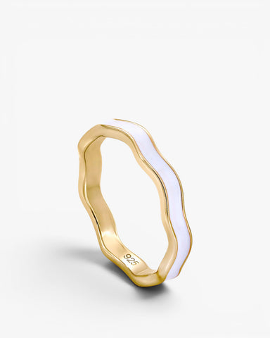 Thin silver rings with white enamel and curvilinear design