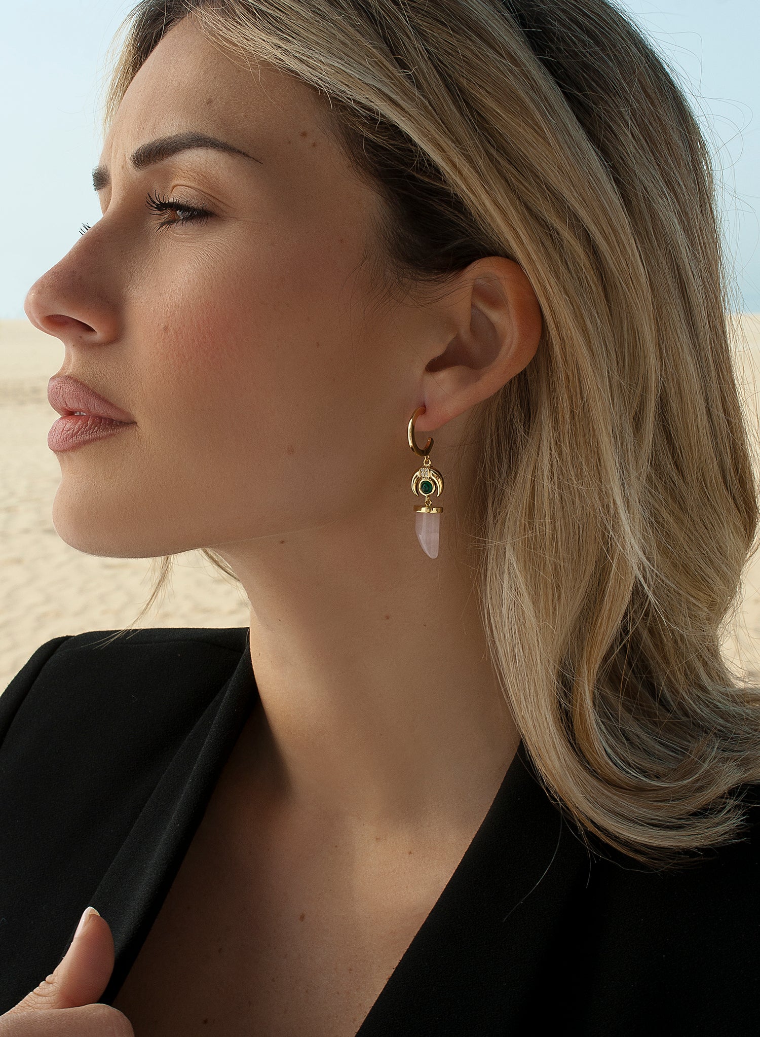 Hoop earrings with horn and inverted crescent moon pendants