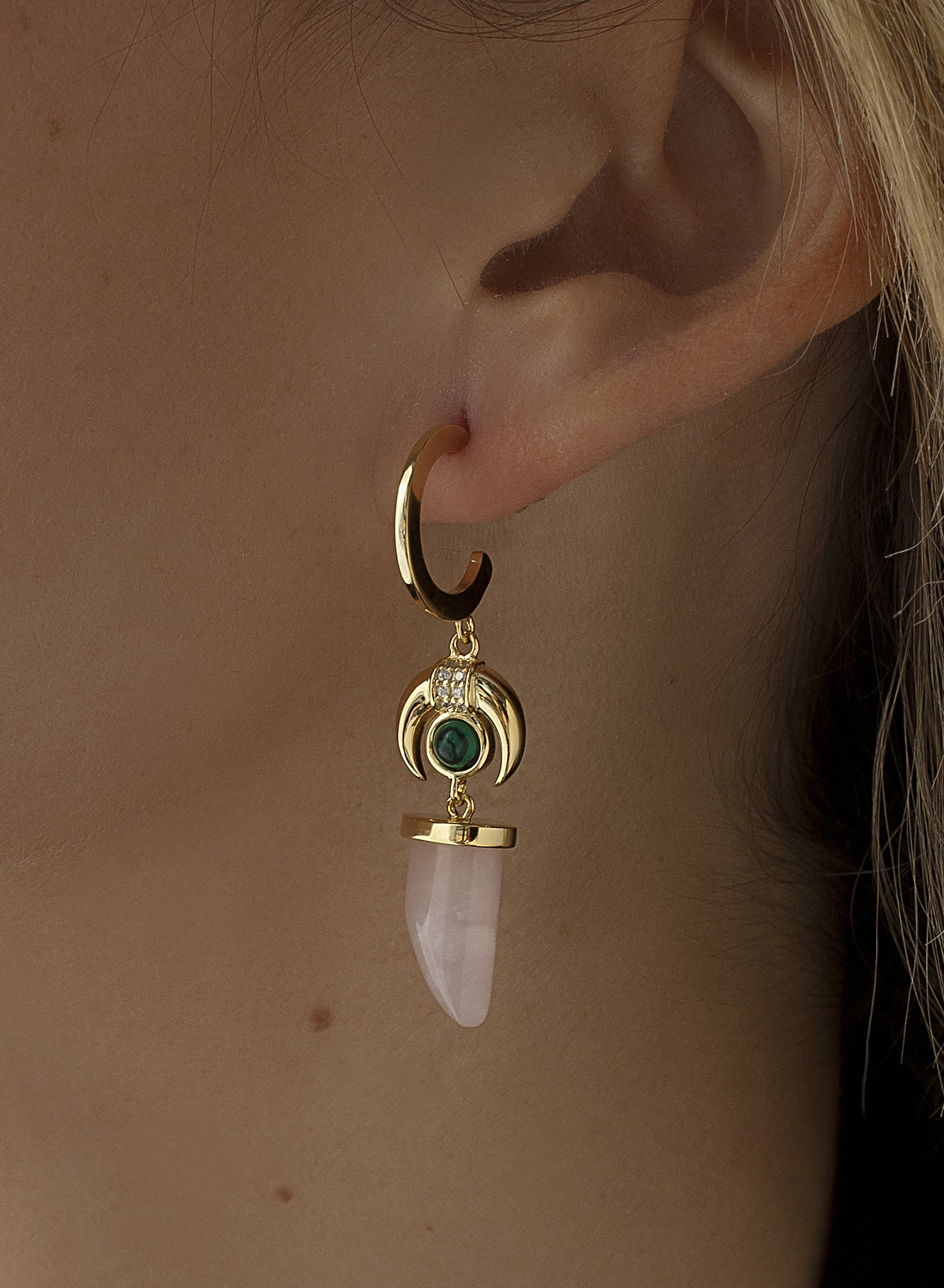 Hoop earrings with horn and inverted crescent moon pendants