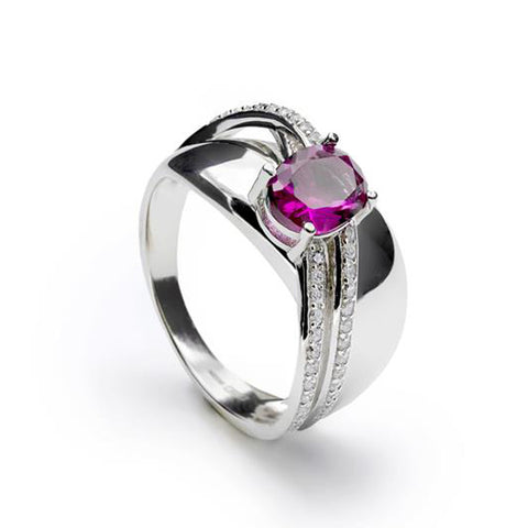 Grandes bagues avec un motif central fuchsia et un design de rail