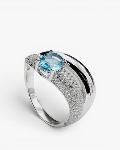 Anillos de diseño curvo con gema en tono aguamarina