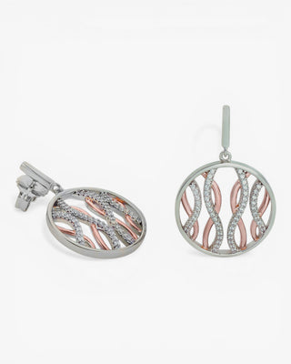 Two-tone earrings with a circular design and intertwined details