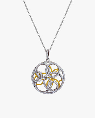 Pendentifs bicolores au motif entrelacé et ornés de zirconiums cubiques