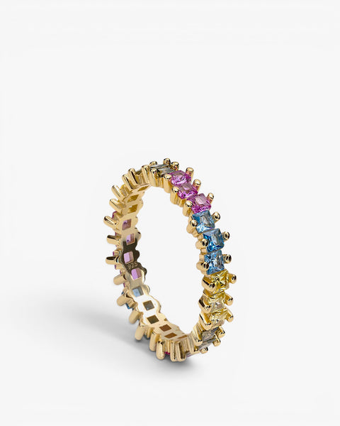 Anillo de plata con piedras de colores en talla princesa con grapas