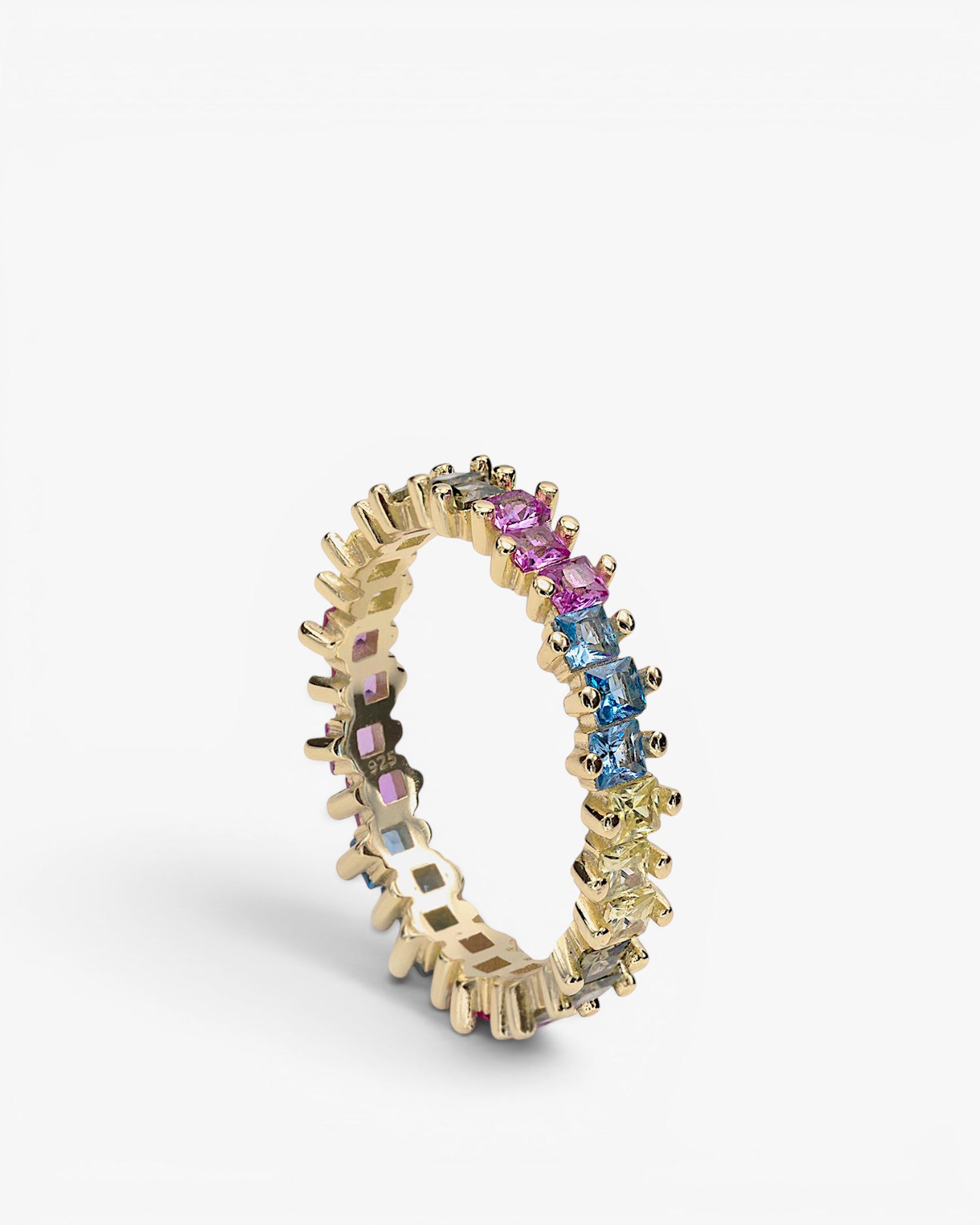 Silver ring with colored stones in princess cut with prongs