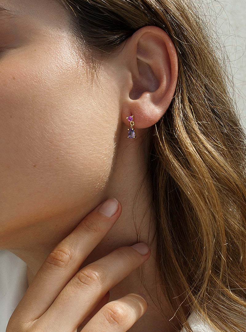 Small dangle-style earrings in shades of blue and pink