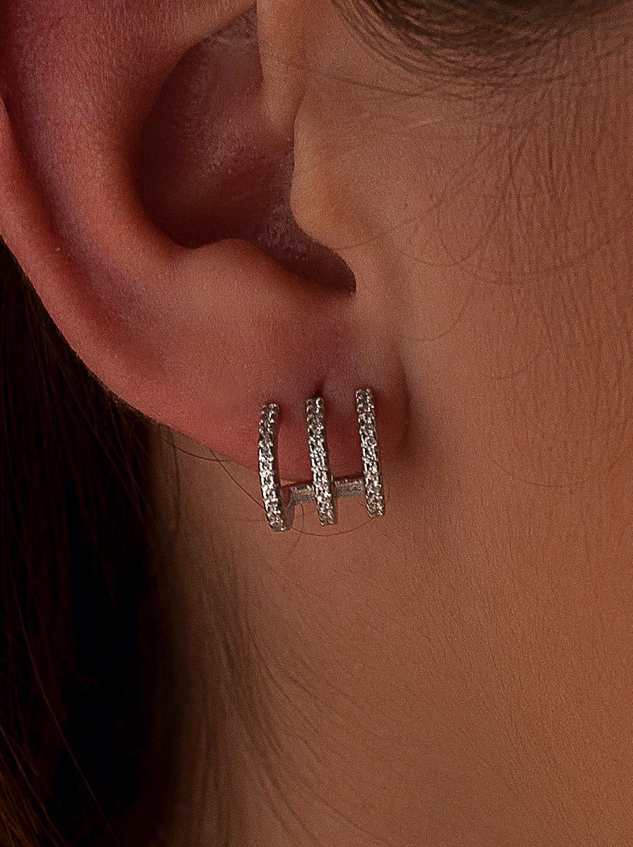 Boucles d'oreilles originaux design rail incurvé de zircons
