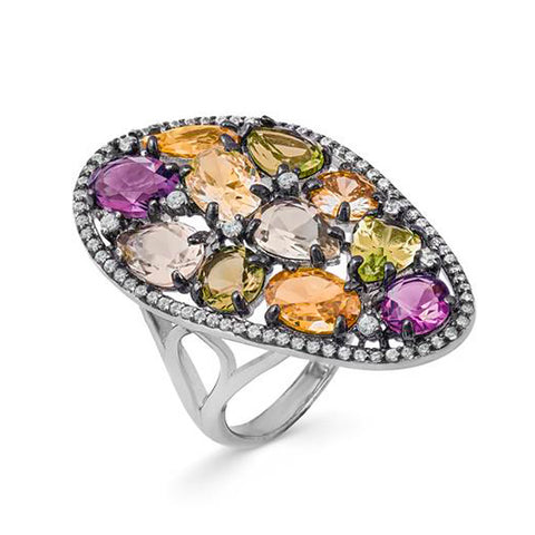 Rings with curvilinear style stones in green mosaic