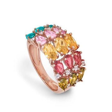 Rings with colored stones and a bow in cool tones