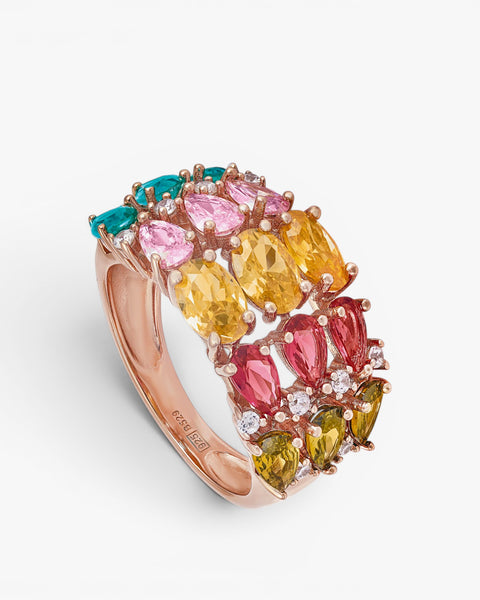 Anillos con piedras de colores y arco en tonos fríos