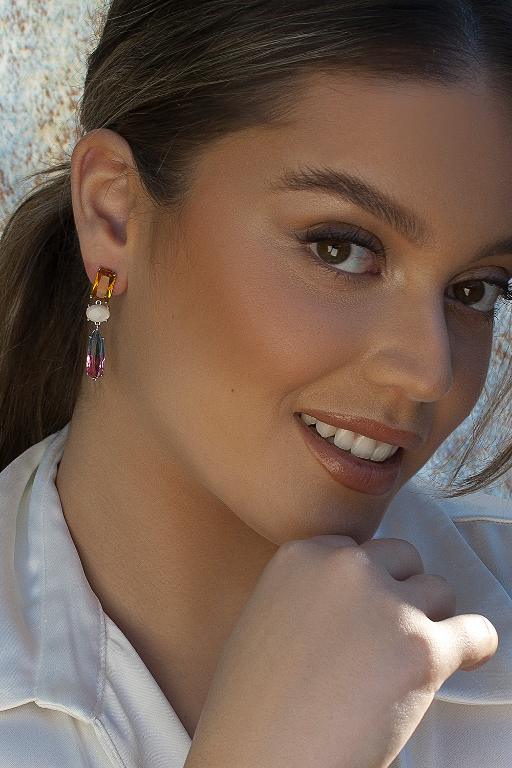 Silver earrings with colorful stones in a gradient design