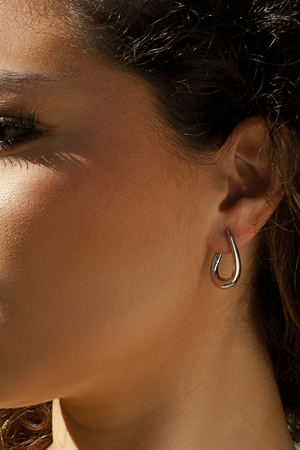 Boucles d'oreilles ovales originales en argent brut