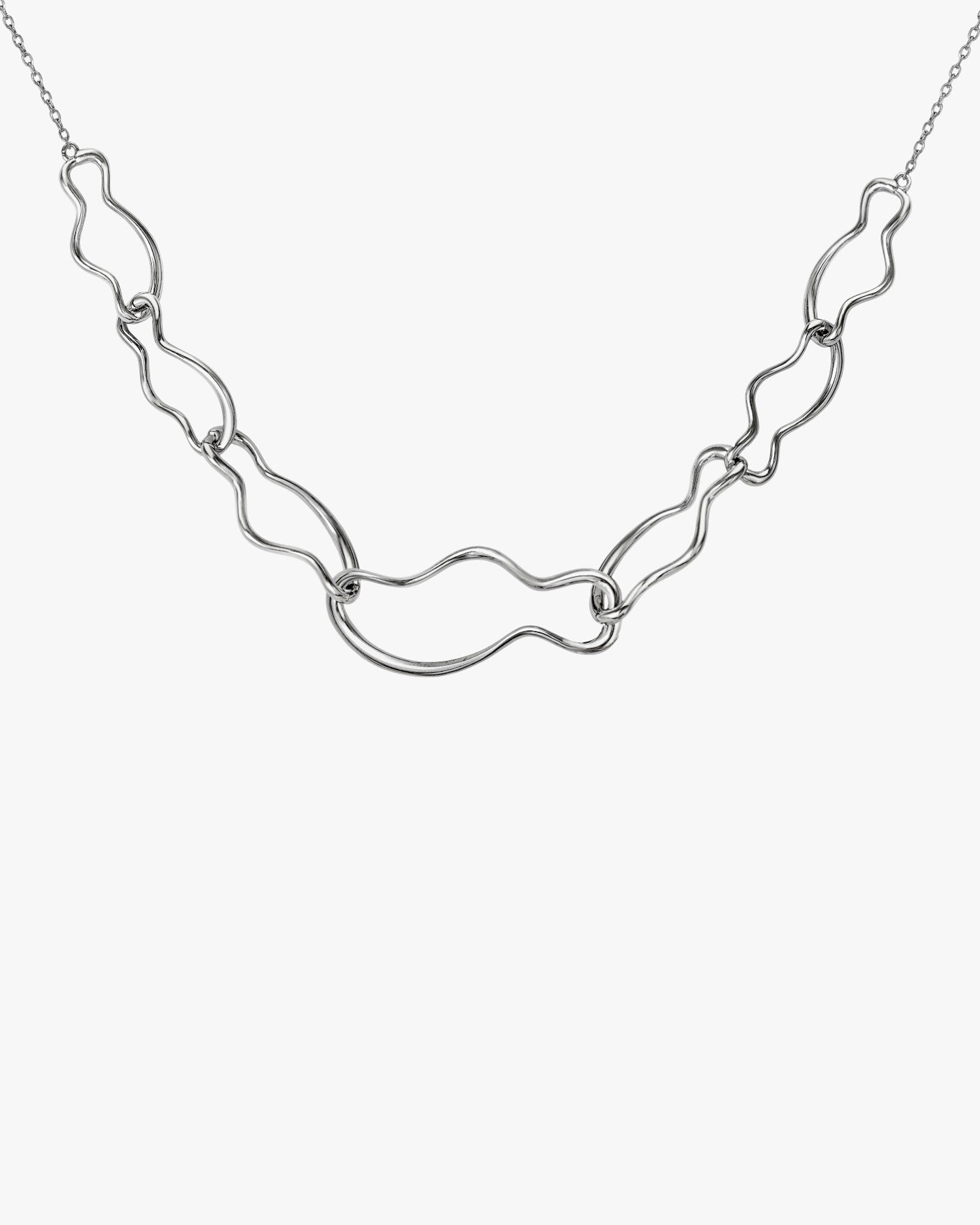 Necklaces with irregular link design pendants in smooth silver