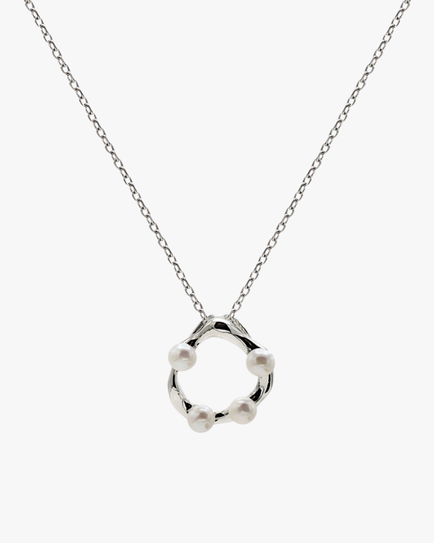 Original silver necklaces with irregular design and embedded mini pearls