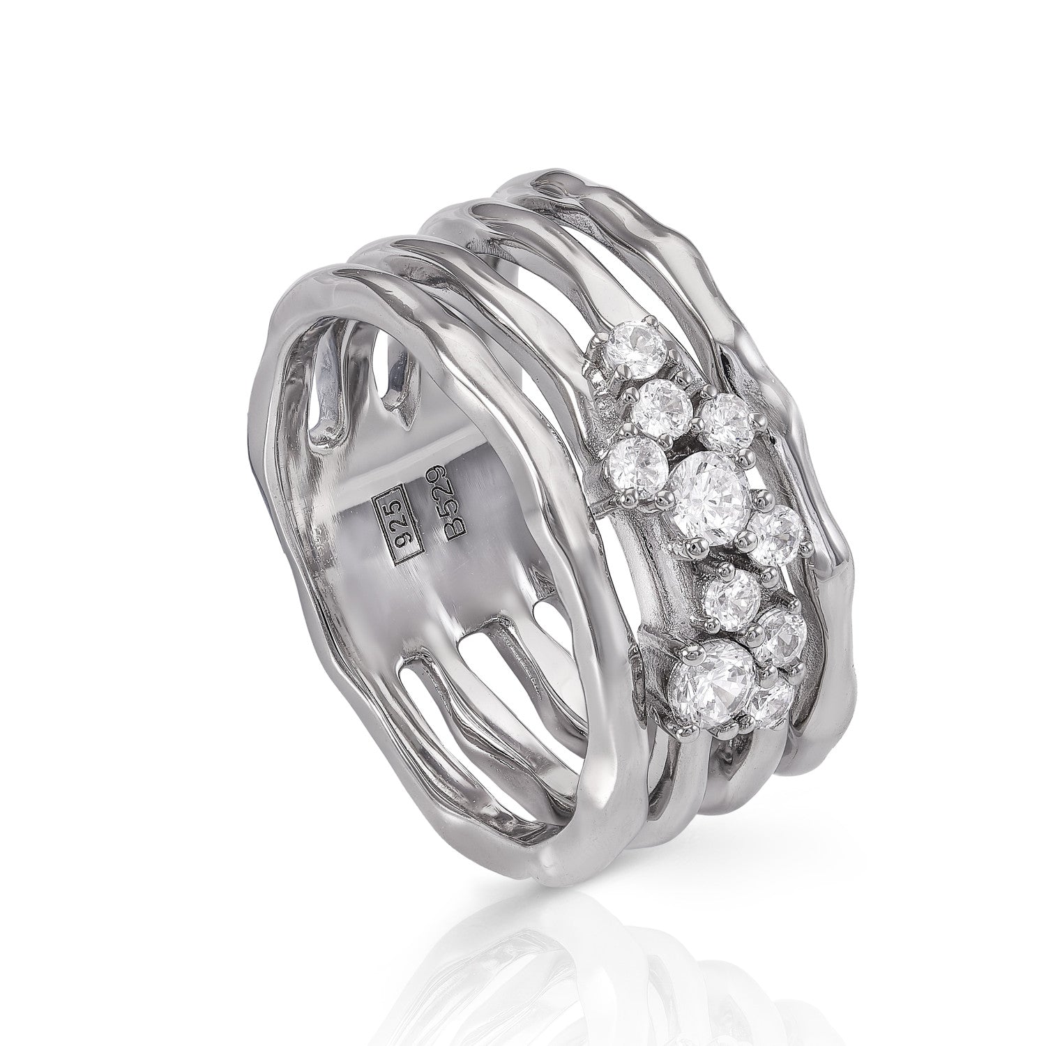 Anillos anchos formados por cuatro railes y circonitas