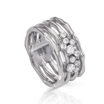 Anillos anchos formados por cuatro railes y circonitas