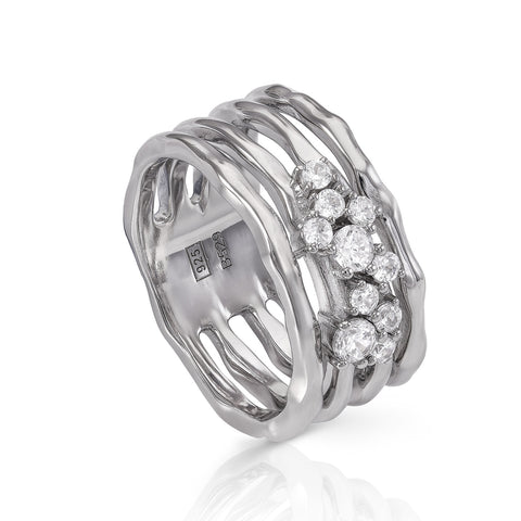 Anillos anchos formados por cuatro railes y circonitas