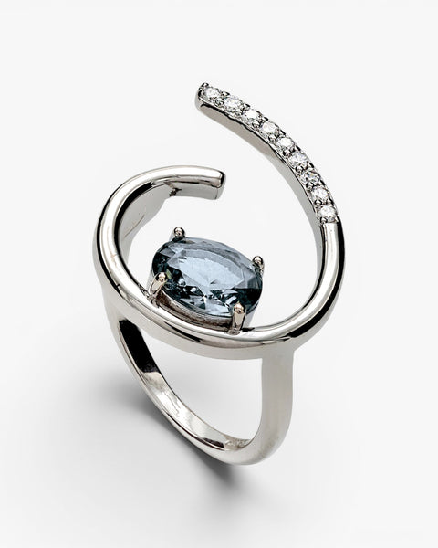 Semi-open design rings with central gemstone and cubic zirconia
