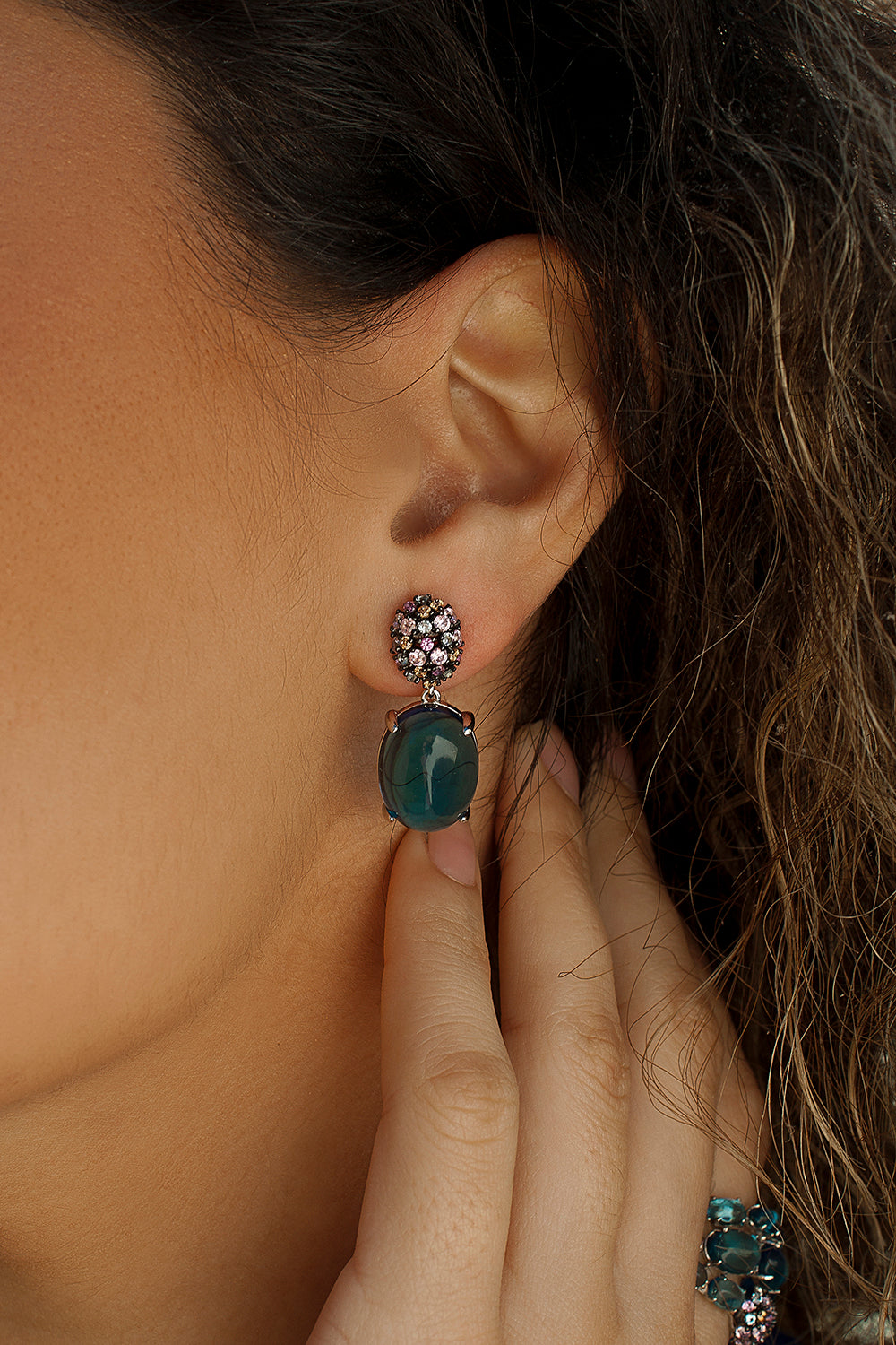 Earrings with cabochon-style pendants and cubic zirconia