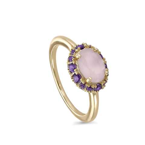Rings with central motif stones in pale pink and violet tones
