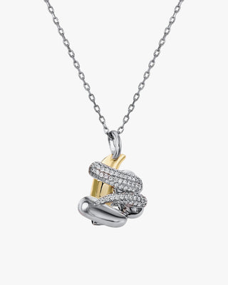 Necklaces with irregularly designed, two-tone pendants with cubic zirconia